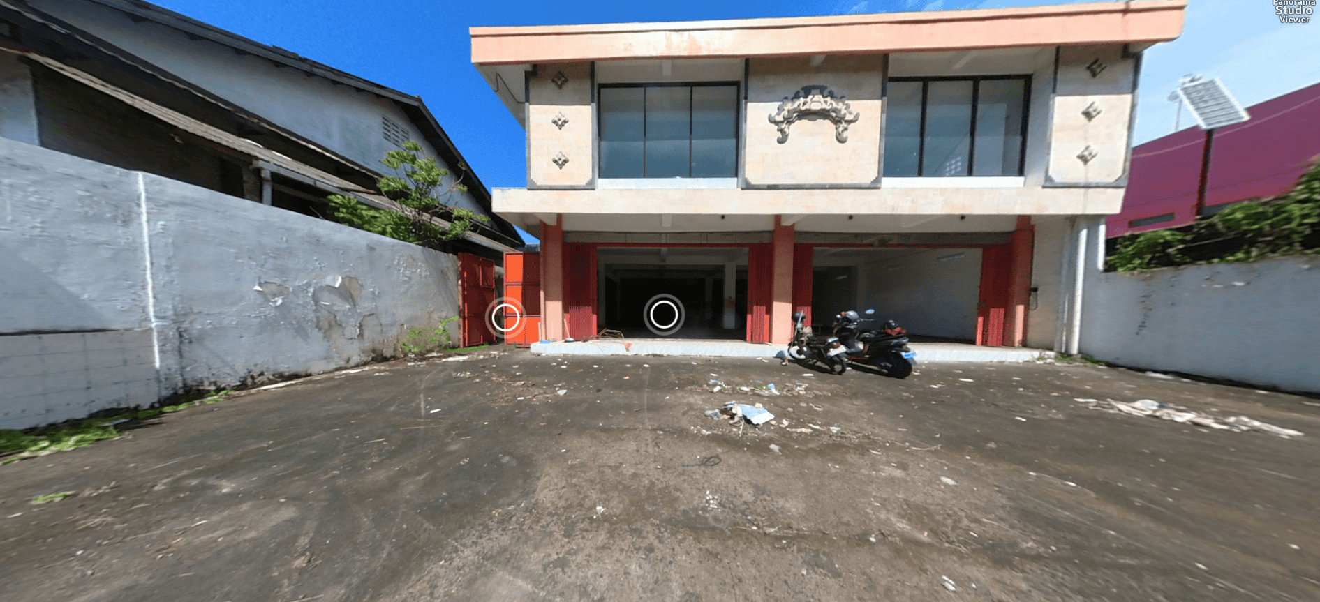 Modern commercial building with parking area in Brighton.